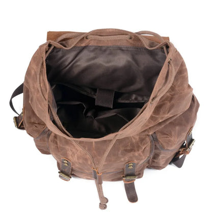 Stylish Waxed Canvas Backpack - Spacious Waterproof Rucksack for Travel and School with Unique Leather Accents