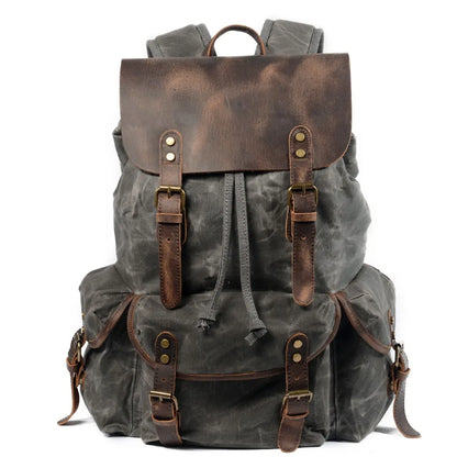 Stylish Waxed Canvas Backpack - Spacious Waterproof Rucksack for Travel and School with Unique Leather Accents