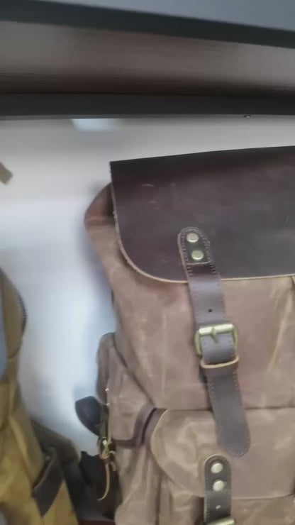 Stylish Waxed Canvas Backpack - Spacious Waterproof Rucksack for Travel and School with Unique Leather Accents